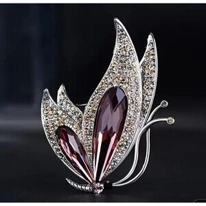 Silver butterfly brooch‎ with pink purple gem